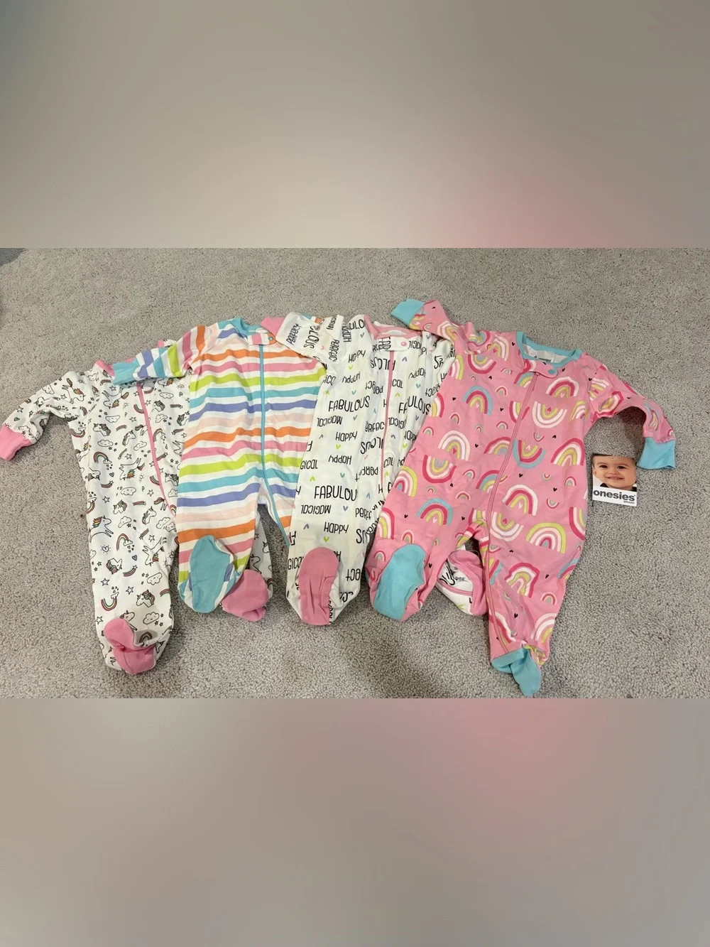 Onesies® Pink Rainbow Print Footed One-Piece for Kids